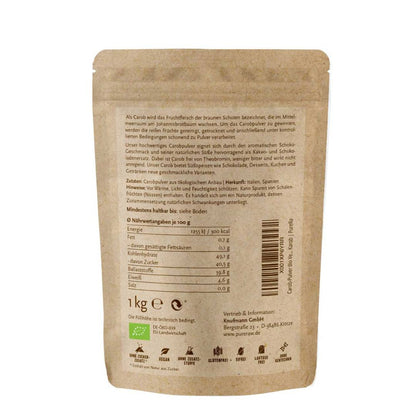 Rückseite eines braunen Kraftpapier-Standbeutels von „PureRaw Carob Pulver“ mit der Nährwerttabelle und den rechtlichen Hinweisen